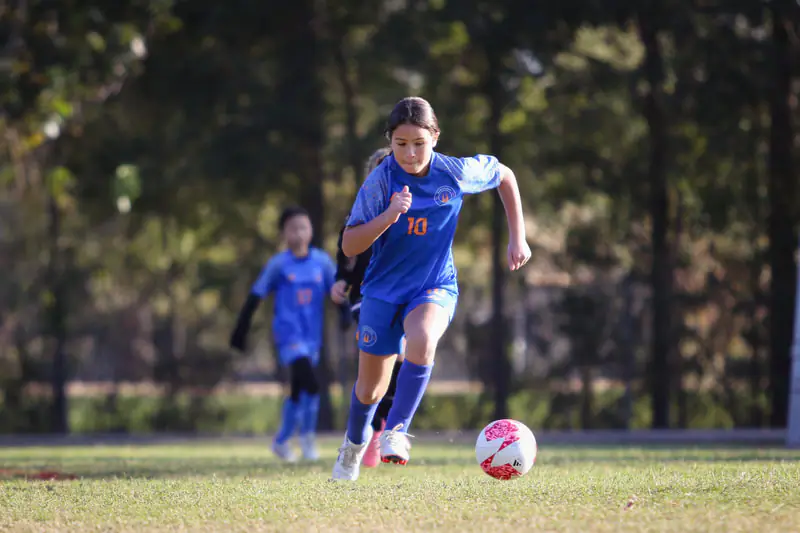 Player dribbling at speed during training